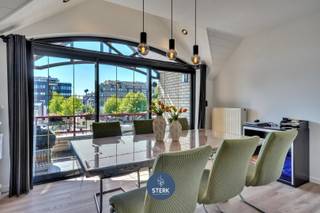 APPARTEMENT MET VERHUURDE STUDIO + 2 GARAGES IN HET CENTRUM VAN LANAKEN ! <br /><br />We vinden dit appartement + studio met een bewoonbare oppervlakte van 109 m² + 18 m² terug op een perceel van 35a 10ca in Lanaken. <br /><br />Voor meer informatie, neem zeker een kijkje op onze website via de volgende link: <br />https://www.sterkvastgoedmakelaars.be/detail/te-koop-appartement-lanaken/7675446?dosearch=True&flowstatus=ForSale,ForSaleReserved,ForSaleWithBid,ToCompleteForSale,SoldUnderReserve,Sold&pageindex=1&pagesize=12&searchpage=ForSale&sortdirection=DESC&sortfield=pub_flowstatus&transactiontype=Sale