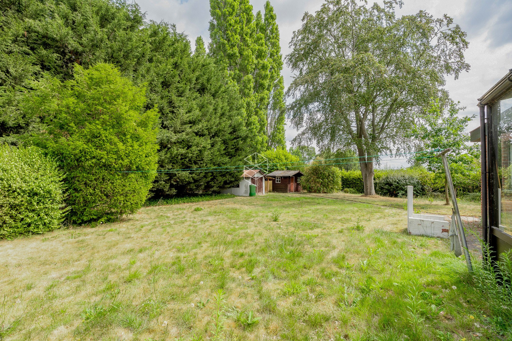 Centraal gelegen gelijkvloerse woning met royale tuin op 1656m² - foto 4