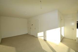 Energiezuinig nieuwbouwappartement op de eerste verdieping met 1 slaapkamer, prachtig terras, ondergrondse autostaanplaats en kelder, gelegen...