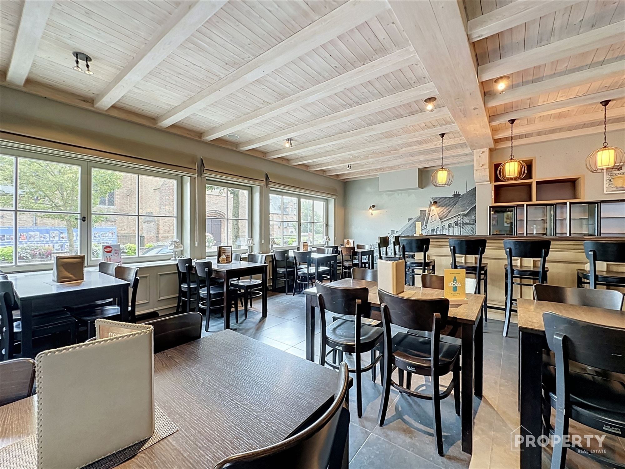 Café op toplocatie met woonst te koop! - foto 4