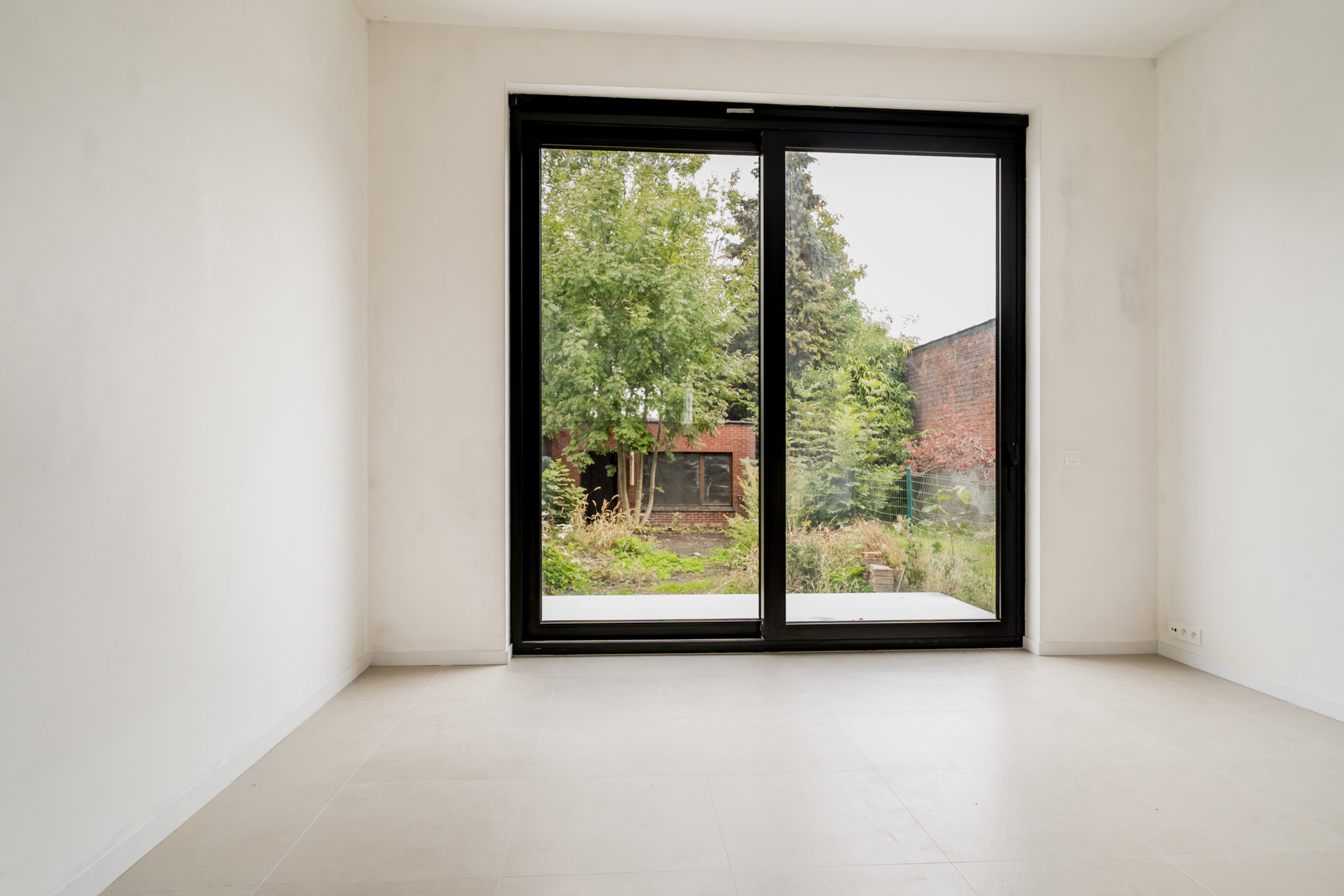 Modern gelijkvloers appartement met tuin - foto 5