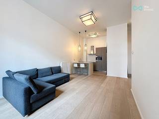 <p>Tel: 0456 12 69 85 Email: clara.ja@weinvest.be<br /><br />We Invest is pleased to present this stunning one-bedroom apartment, exclusively available and offering a generous surface area of 70 m².<br /><br />Located in an iconic building in the heart of Brussels, this exceptional space combines prestige with historical charm. Formerly the General Savings and Pension Fund, the building captivates with its majestic architecture blending classical elegance and Art Deco touches. Ideally situated near public transport, shops, and key Brussels institutions, this property is a perfect opportunity for those who appreciate characterful living spaces.<br /><br />The apartment features a bright living room open to a modern, fully equipped kitchen with a central island. It also includes one bedroom, a bathroom with a bathtub, a walk-in shower, and a laundry area.<br />A private parking space is also included.<br /><br />The rent is €1,230, including the private parking space.<br /><br />Charges amount to €220 and include: water, heating, concierge service, and maintenance of the common areas.<br /><br />EPC:B+<br /><br />Available immediately !<br /><br />Don’t miss this opportunity! To discover more exclusive listings, visit www.weinvest.be!<br /><br /><br /><br /></p>