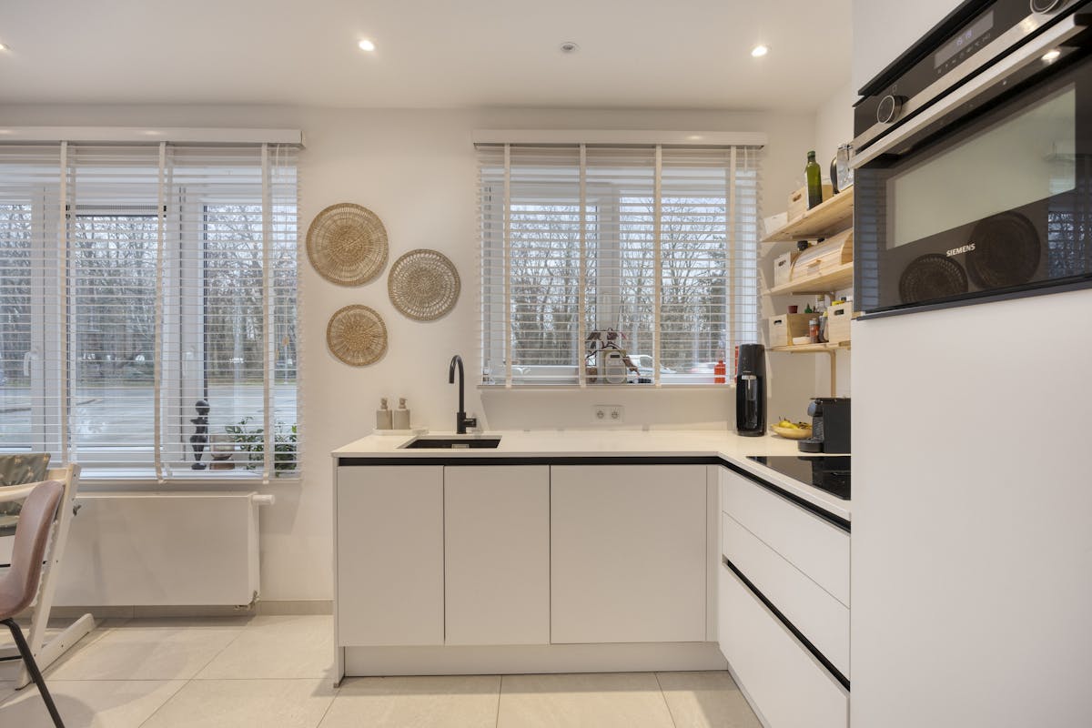 Appartement au rez-de-chaussée avec beau jardin sud et garage - photo 4