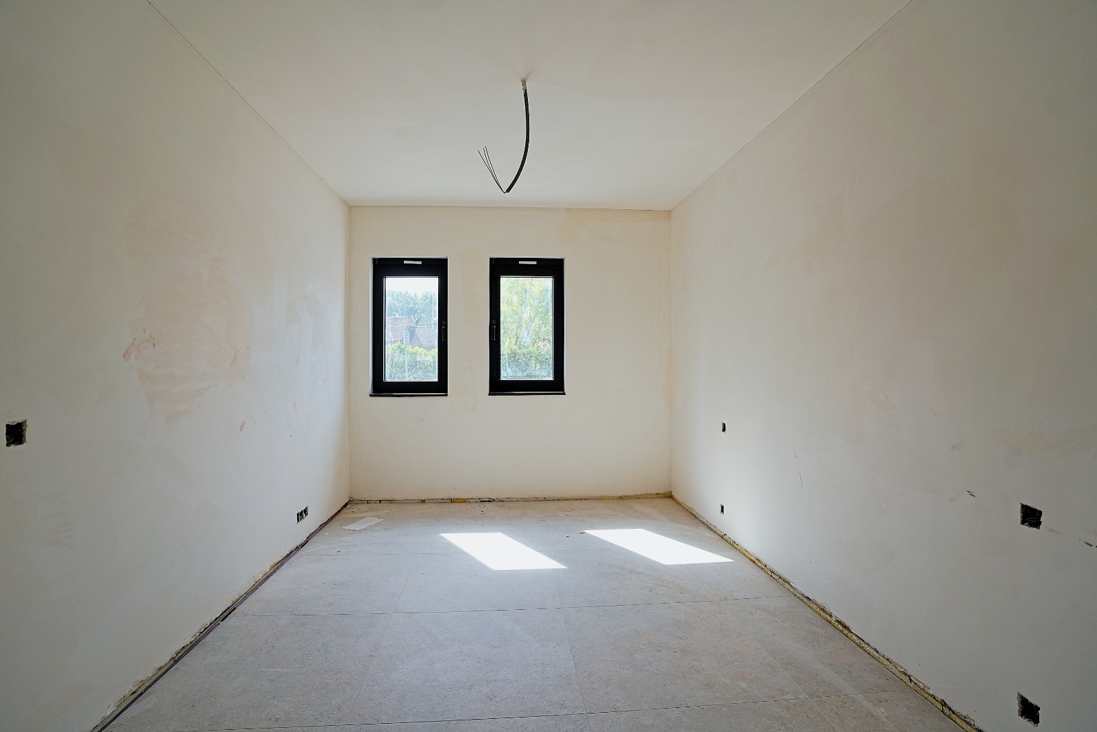 Net opgeleverd ruim nieuwbouwappartement met 2 slaapkamers en tuin in het centrum van Bornem. - photo 5