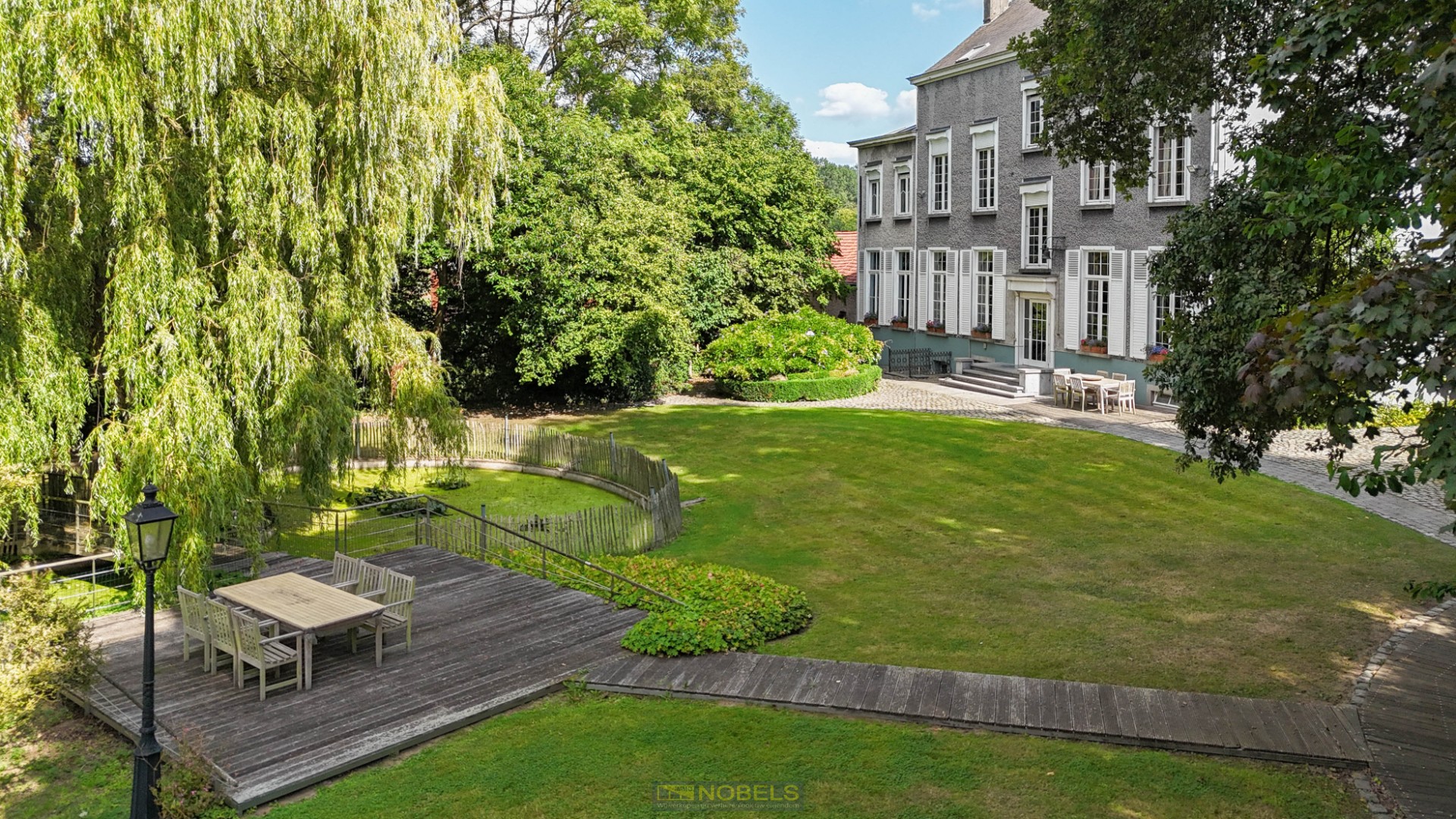 Te koop, historisch herenhuis met parkdomein en boomgaard op 1,4 ha - photo 4