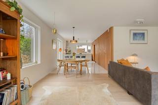 Instapklare woning waar hedendaags wooncomfort en rust in het groen samenkomen! Deze open bebouwing in Ten Ede, op de grens met Heusden, onderging...