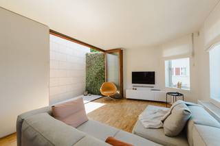 Enter this duplex penthouse (151m²) via the private entrance on the 1st floor. The entire 2nd floor is open-plan: living room with a stylish...