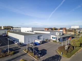 Vastgoedvennootschap met als onroerend actief een verhuurd bedrijfsgebouw te Kuurne bestaande uit:*Magazijn:- met een oppervlakte van 1.910 m²...