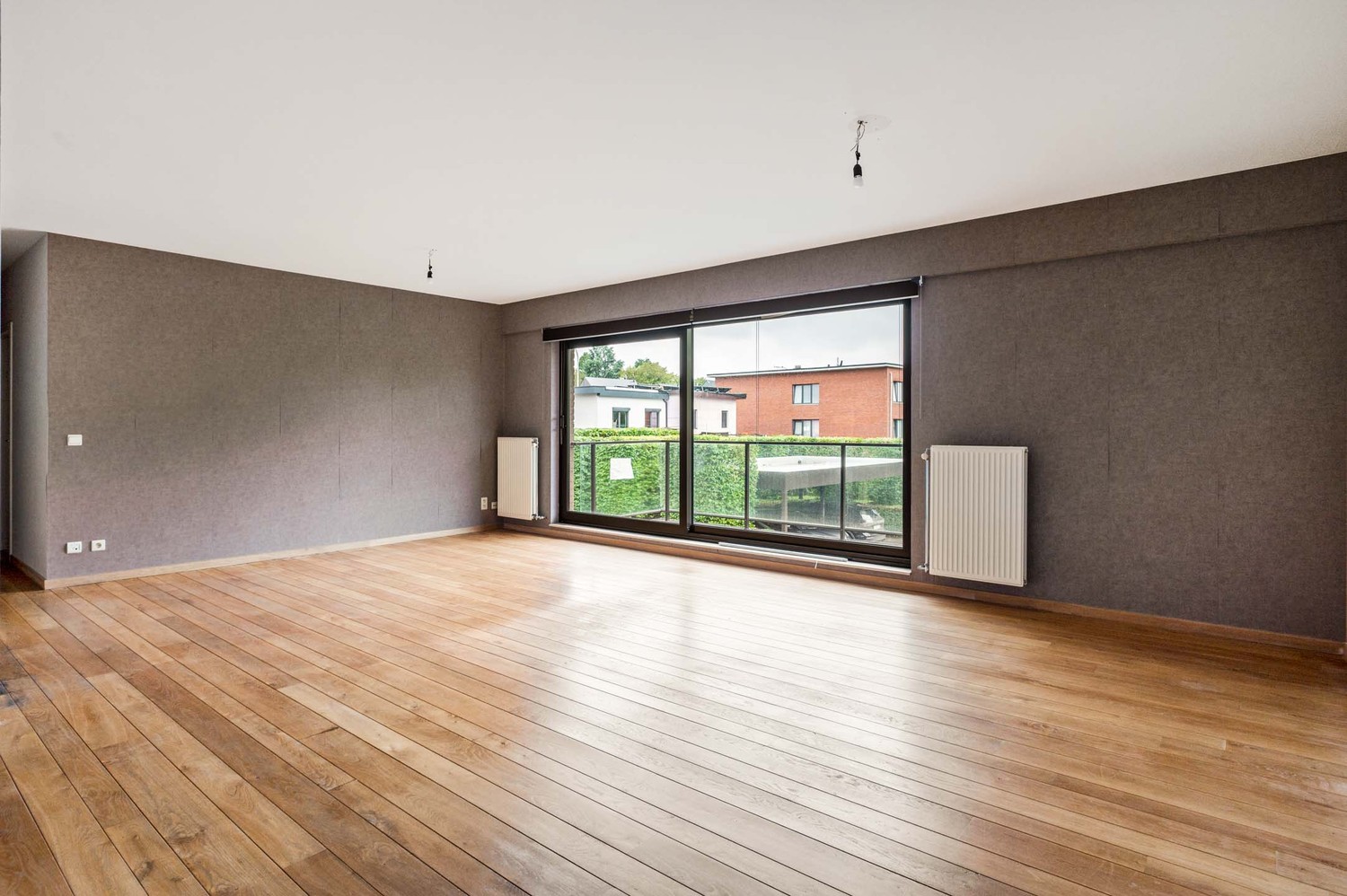 Ruim appartement met zonnig terras en garagebox op toplocatie in Wijnegem! - foto 5