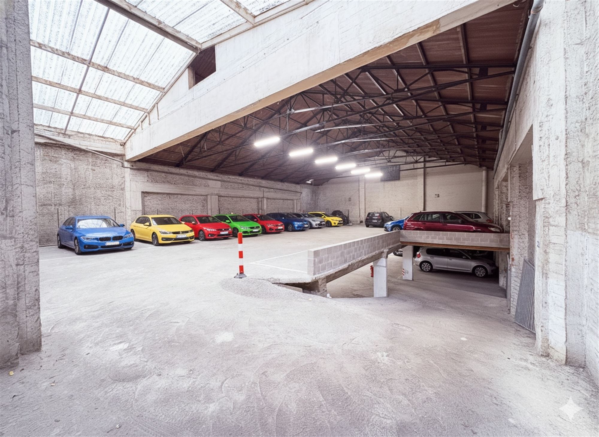 60 parking spaces - 5 motorcycle spaces and 2 warehouse spaces - photo 1