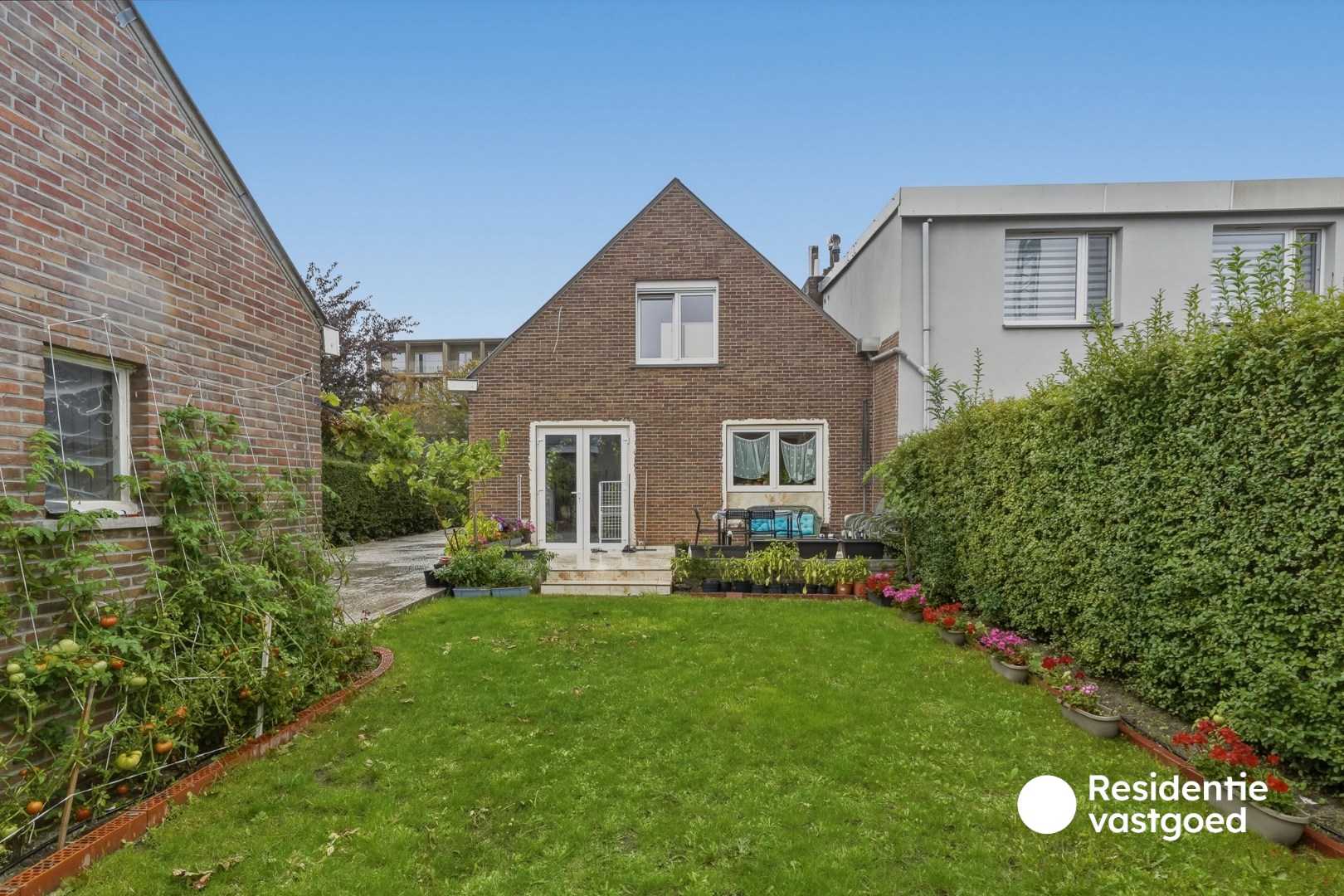 Halfopen woning met tuin en garage te koop - foto 3