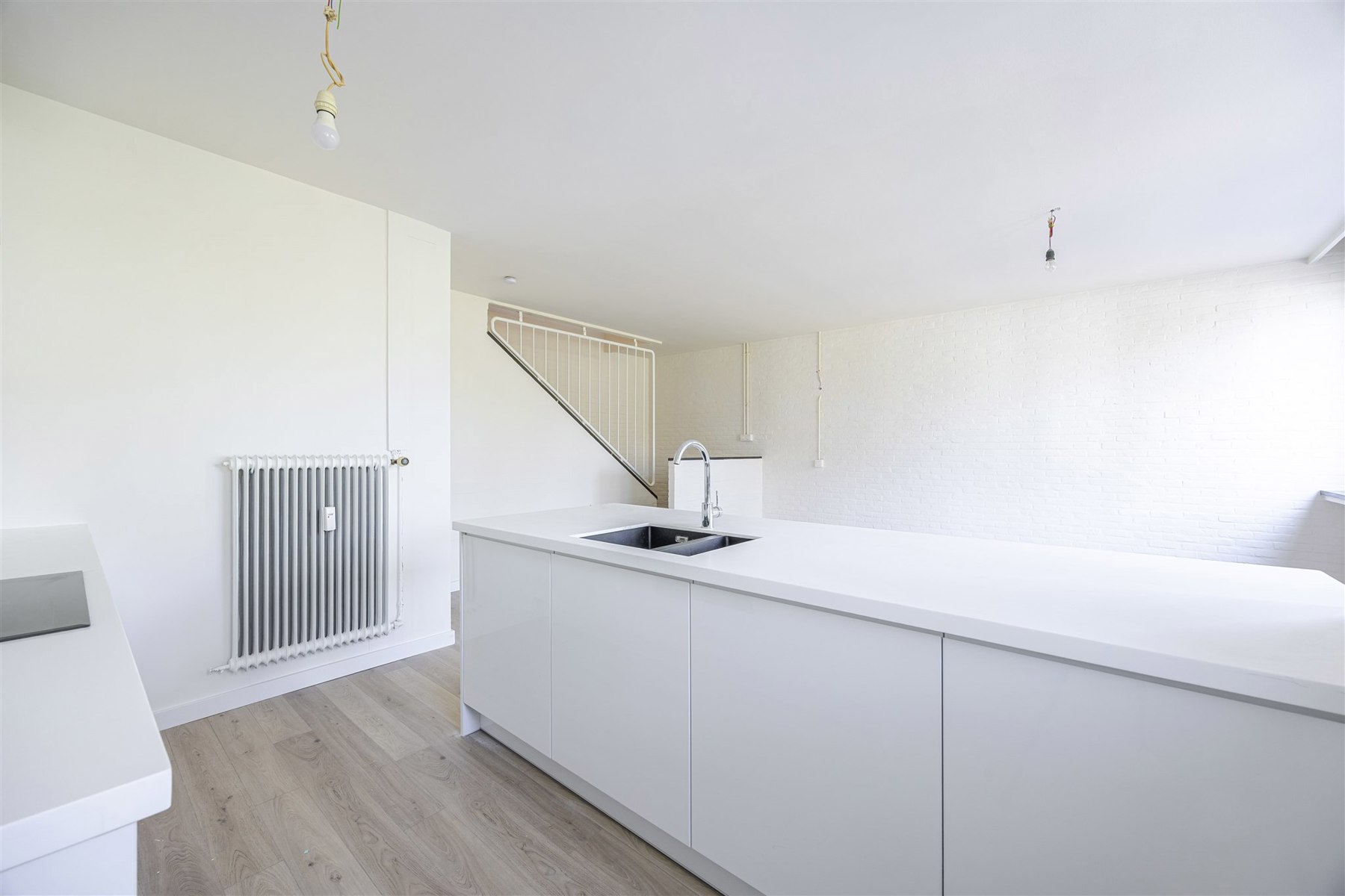 Gerenoveerd duplexappartement met 2 slaapkamers - foto 4