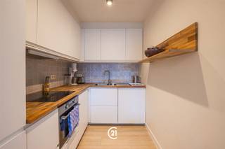 <p>Modern, move-in-ready apartment in downtown Zottegem!</p><p>Located on Trapstraat, just one side street away from the market square, this one-bedroom apartment is on the first floor. Thanks to its central location, shops, restaurants, and public transportation are easily accessible.</p><p>The apartment features a pleasant living area with an open kitchen. It also includes a spacious bedroom with an adjoining walk-in closet, a shower room, and a separate toilet.</p><p>A modern and practical apartment in an excellent location, ideal for those who prefer to live centrally.</p><p>The rent is 645 euros, and the common area fees total 89 euros.</p><p>Interested? Don’t hesitate to contact us to schedule a viewing.<br /> </p>