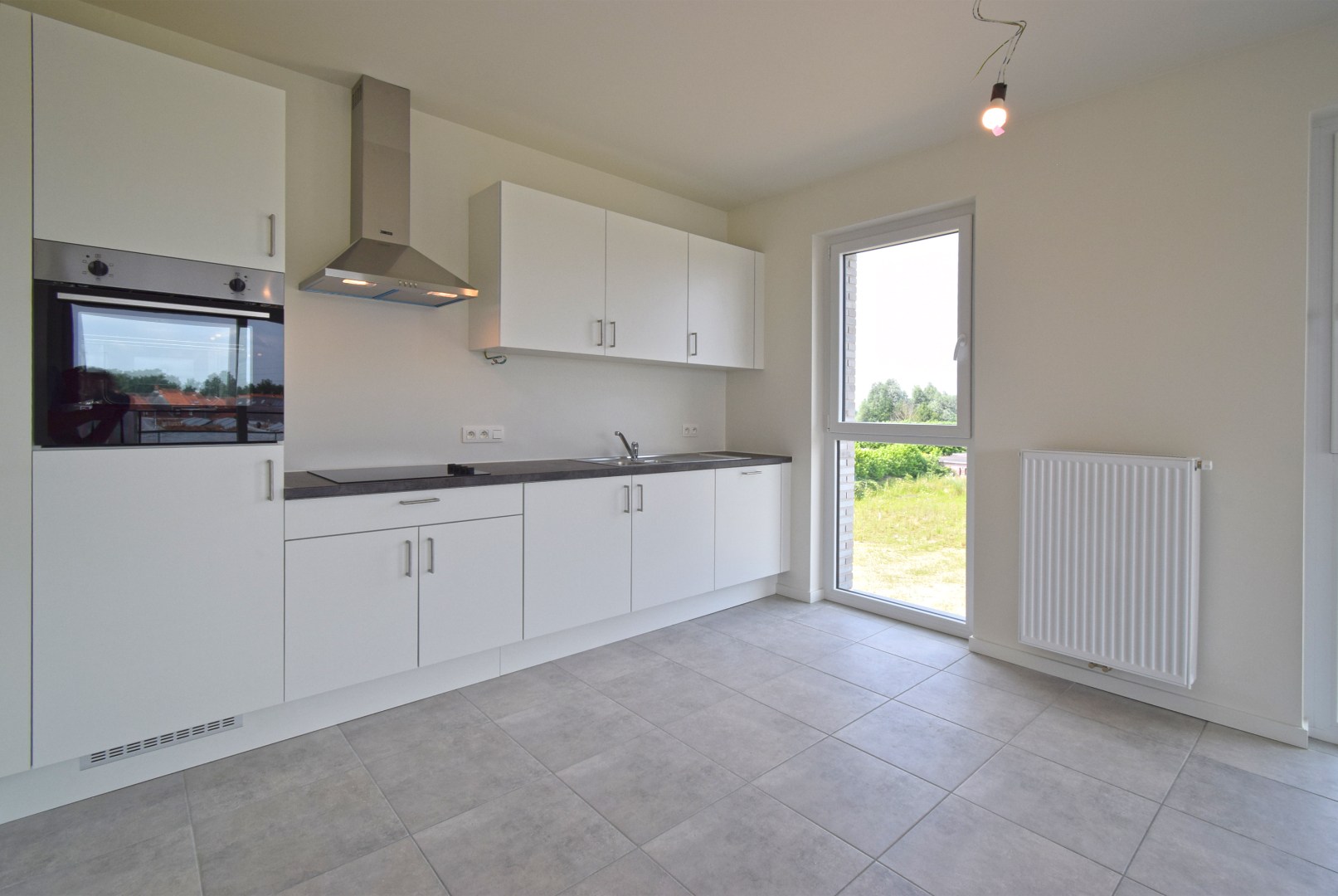 INSTAPKLAAR NIEUWBOUWAPPARTEMENT MET RUSTIGE LIGGING - foto 4