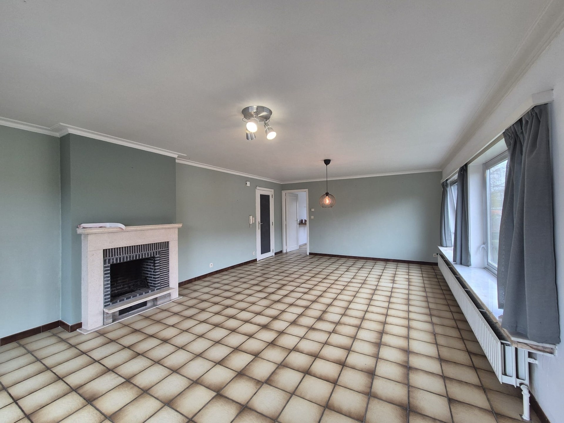 Centraal gelegen ruim appartement met groot zongericht terras en garage. - foto 4