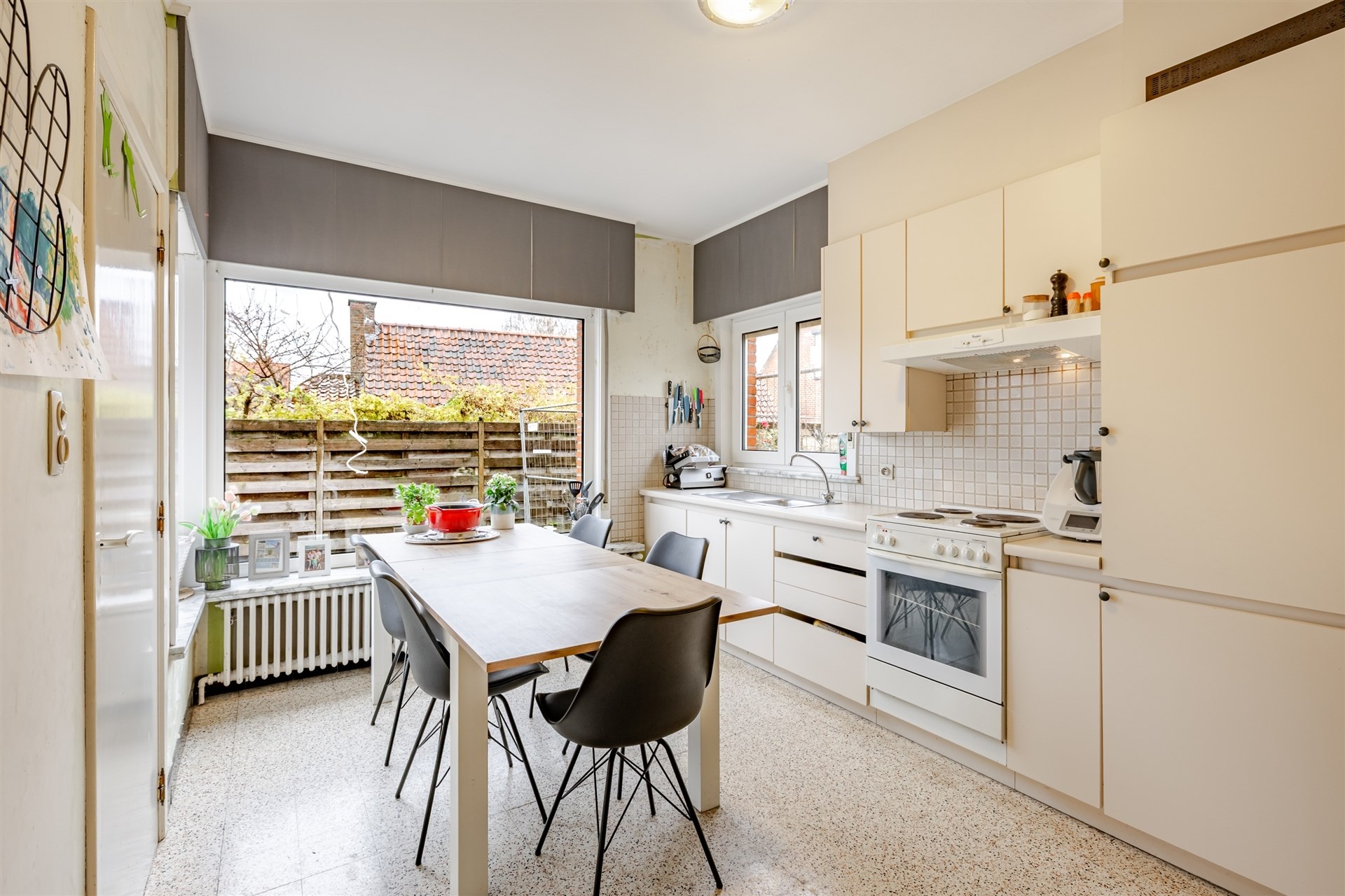 Op te frissen woning met supertoffe tuin, nabij het centrum! - foto 3