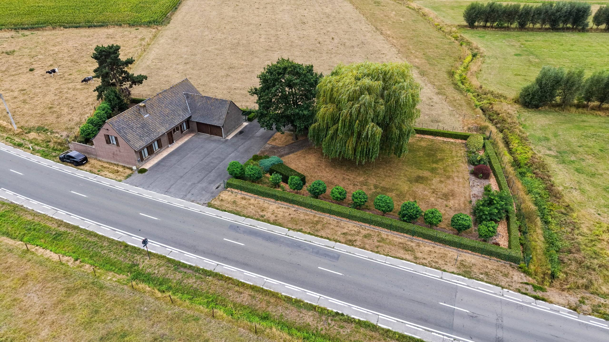 Ruime woning met uitzonderlijk potentieel op groene stadsrand van Tielt - foto 2