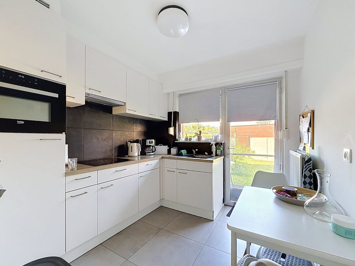 Gelijkvloers appartement te huur met tuin in Merksem - foto 4
