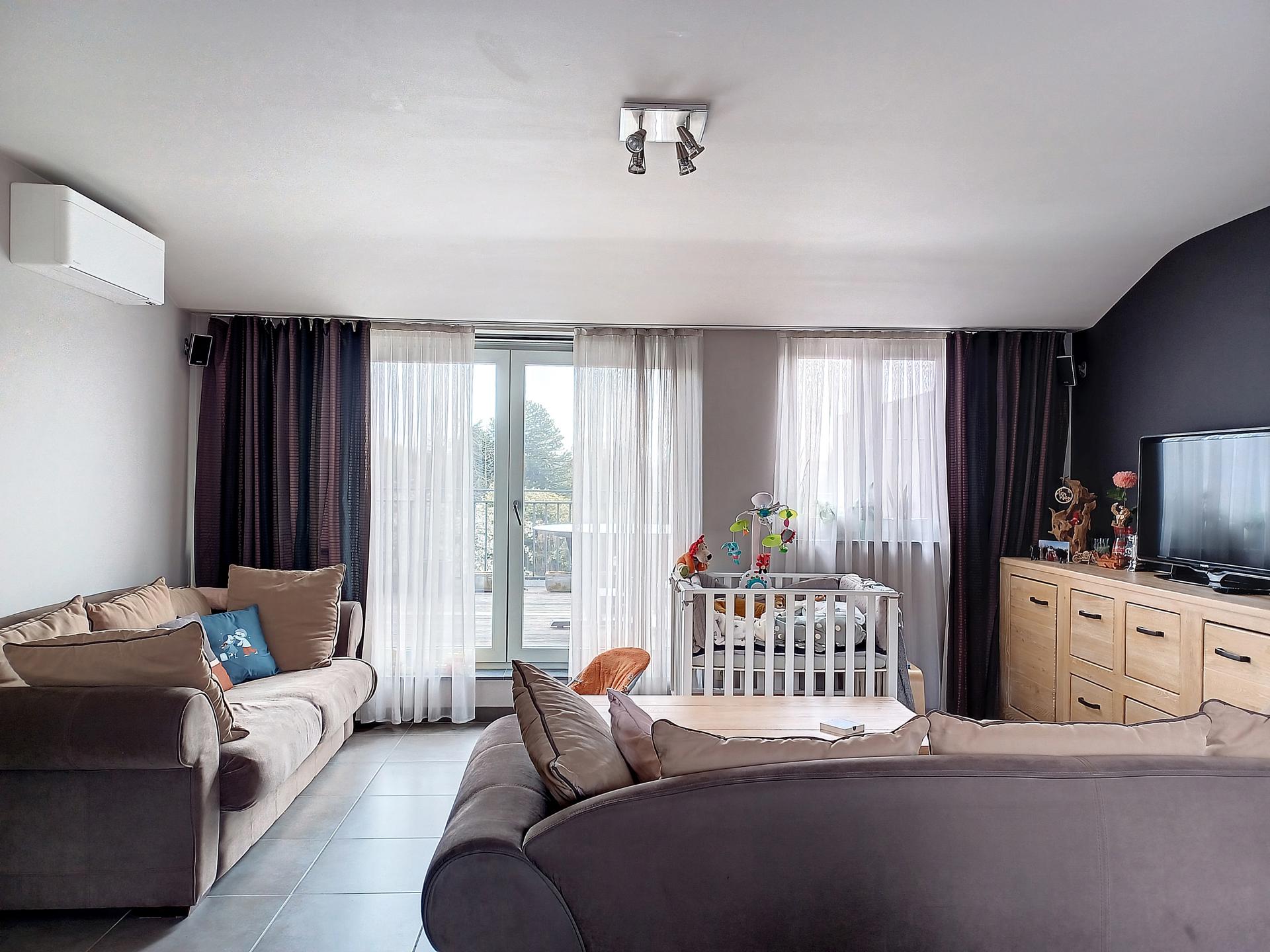 Aangenaam dakappartement met gigantisch terras (42 m²).  - foto 2