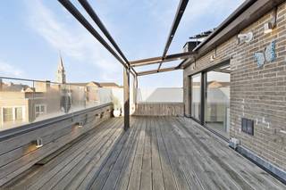 Bright roof apartment (approx. 40 m²) with veranda and 2 spacious terraces for sale located on the fourth floor in residence Boudewijn...