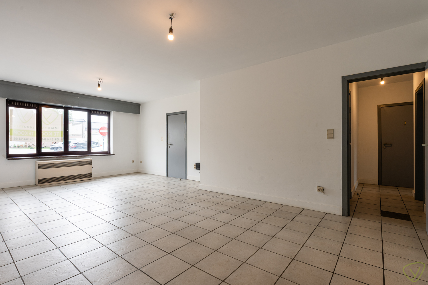 Ruim gelijkvloersappartement met private garage in de Kaaistraat! - foto 5