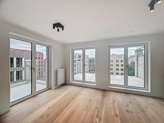Ontdek dit prachtige appartement in het hart van de bruisende Tour & Taxis-wijk!Dit recent gebouwde éénslaapkamerappartement aan de Parkdreef...