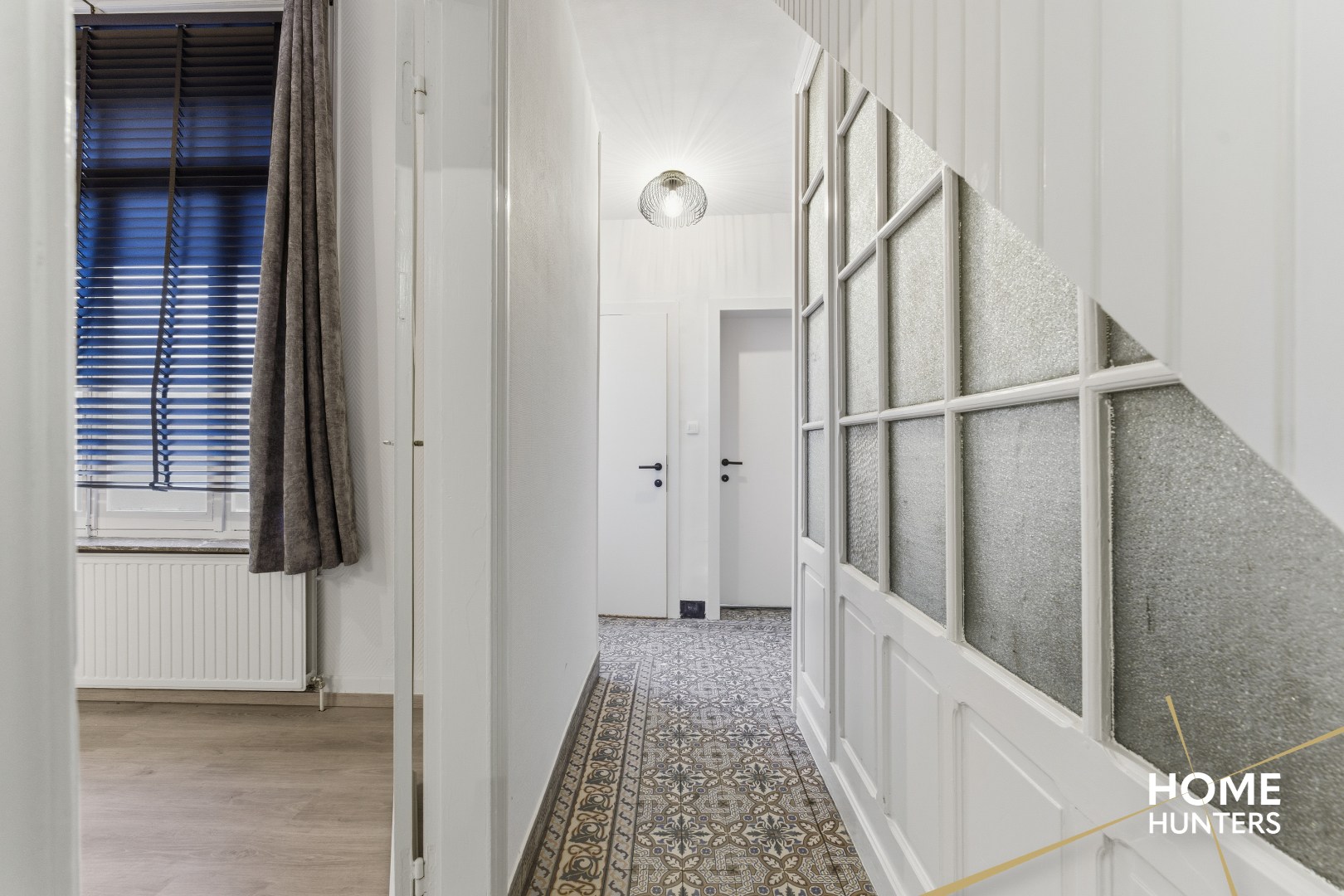 Ruim éénslaapkamer appartement met uniek zicht op het astridpark en de Sint Maartens Kathedraal te Ieper - foto 5