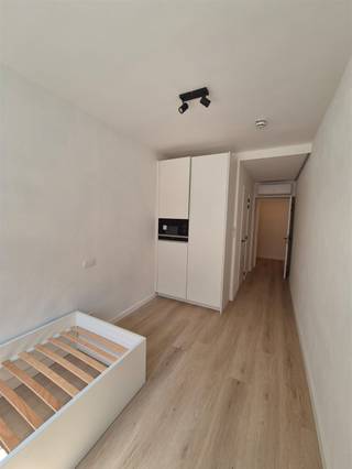 Exclusief gebouw op een unieke locatie in het centrum van Kortrijk- Studentenkamers met eigen sanitair- Gemeenschappelijke keuken...