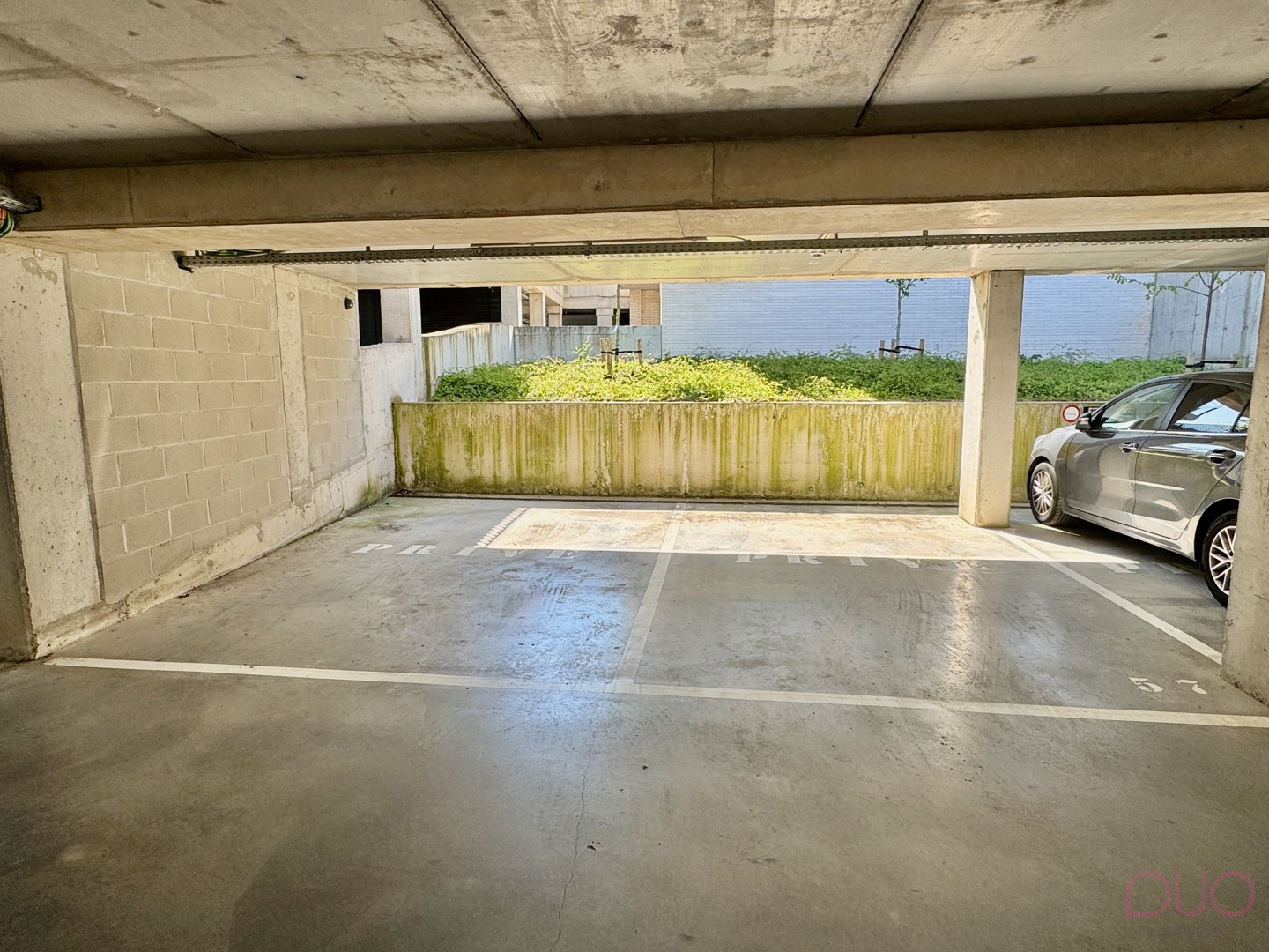 Ruime ondergrondse autostaanplaats met mogelijkheid tot laadpaal in residentie De Stadspoort. - foto 4