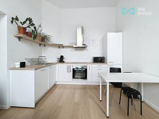 Tel: 0456 12 69 85E-mail: clara.jacquy@weinvest.beWe Invest biedt u met plezier en in exclusiviteit dit lichtrijke appartement met twee slaapkamers...