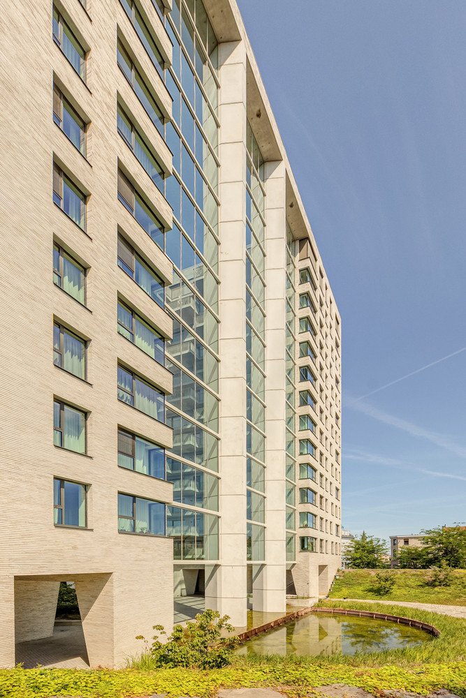 Luxueus en zorgeloos wonen op hoog niveau in de iconische Residentie Louise Marie - 2 slaapkamers en ruim terras (EPC A!) - verkoop onder het registratiestelsel! - foto 4