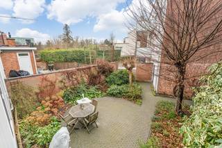 Koning Albertlaan / Koningin Astridlaan : mooie brede woning met aparte zij-ingang en garagebox nabij het Station van Leuven, het Park...