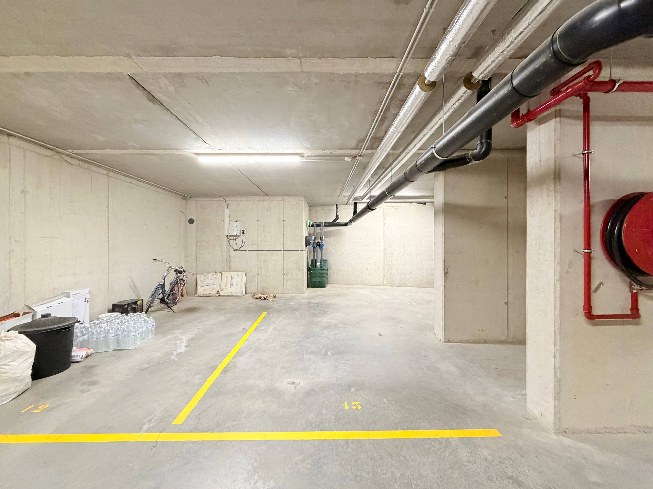 Ondergrondse autostaanplaats in centrum van Evergem - foto 1