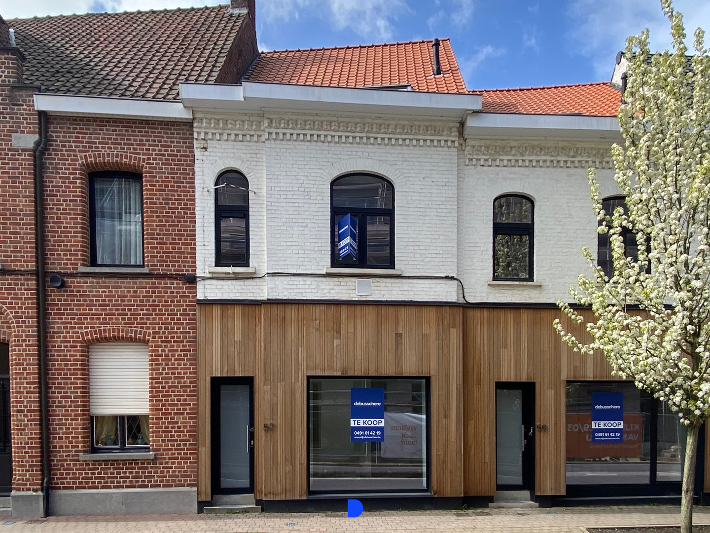 Stijlvol gerenoveerde woning met lichtrijke leefruimtes en tuin - foto 1
