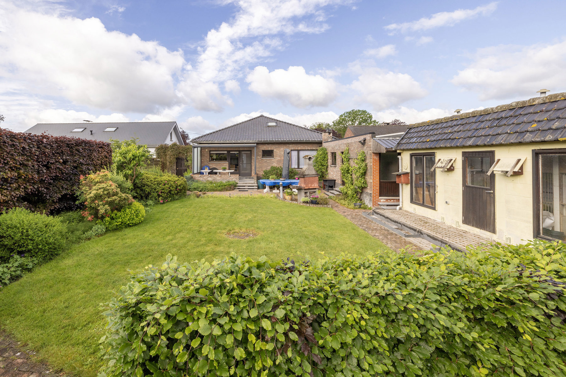 Onderhouden laagbouwwoning met 3slpk, garage en tuin - foto 2