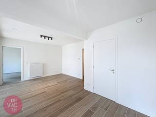 Dit moderne éénslaapkamerappartement op de 4de verdieping heeft een bewoonbare oppervlakte van ± 65 m² en een terras van ± 7 m². De...
