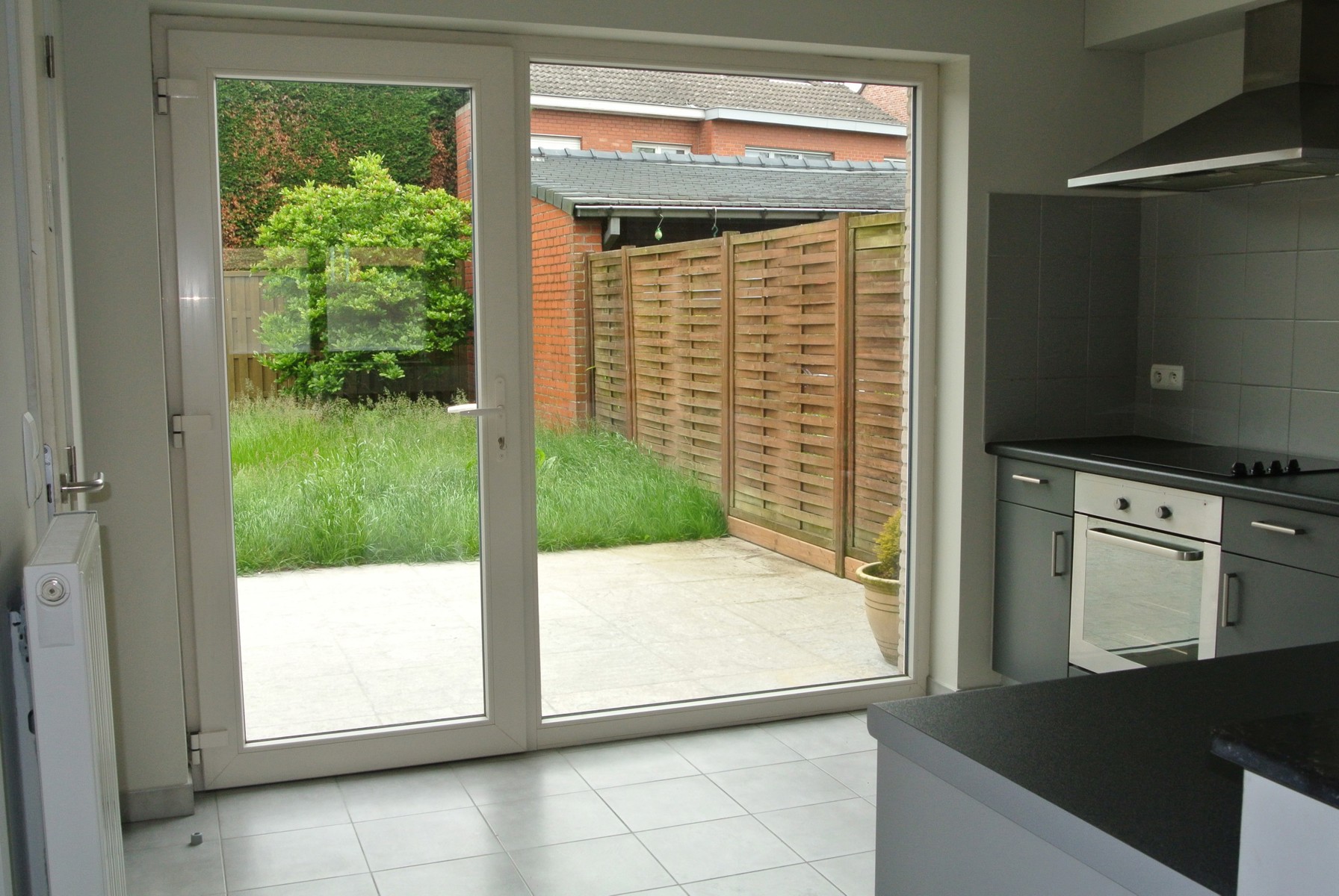 Gezellige gelijkvloers appartement met 2 slaapkamers + terras en tuintje - foto 5