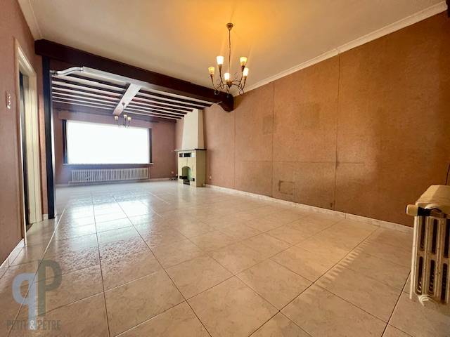 Ruime woonst met 3 slaapkamers, oprit en grote tuin - foto 4