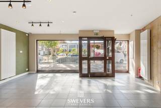 Interesse? Meer informatie op www.SWEVERS.be. - In het centrum van Lummen bevindt zich aan de Dorpsstraat 4 een veelzijdig eigendom dat wonen...