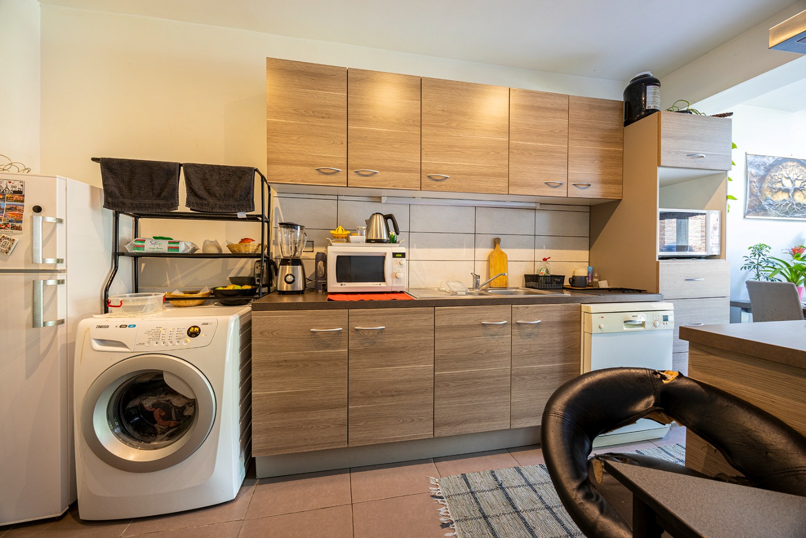Verhuurd gelijkvloers appartement met 1 slaapkamer en tuin! - foto 4
