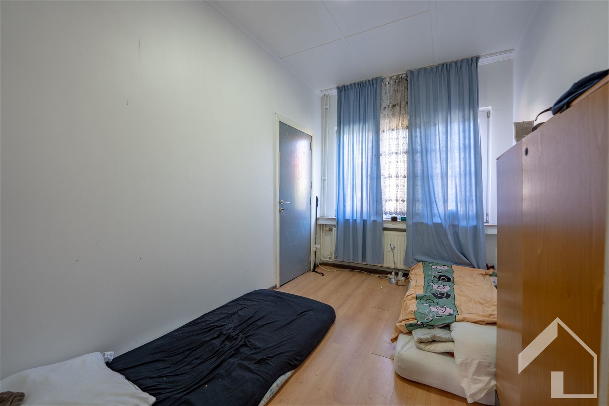 Ruime woning (190 m²) met tuin en veel potentieel - foto 4