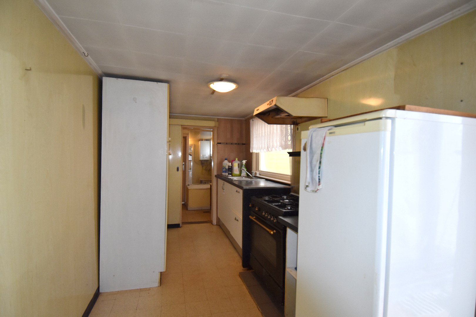 Te renoveren woning met tal van mogelijkheden en ruime opslagplaats (65,5 m²) te koop in Bissegem - foto 5