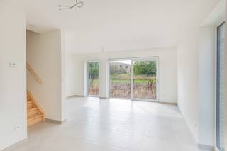 Te huur in Rotselaar: in het nieuwbouwproject Beversluis vindt u deze volledig afgewerkte woning met drie slaapkamers, tuin en buitenstaanplaats...