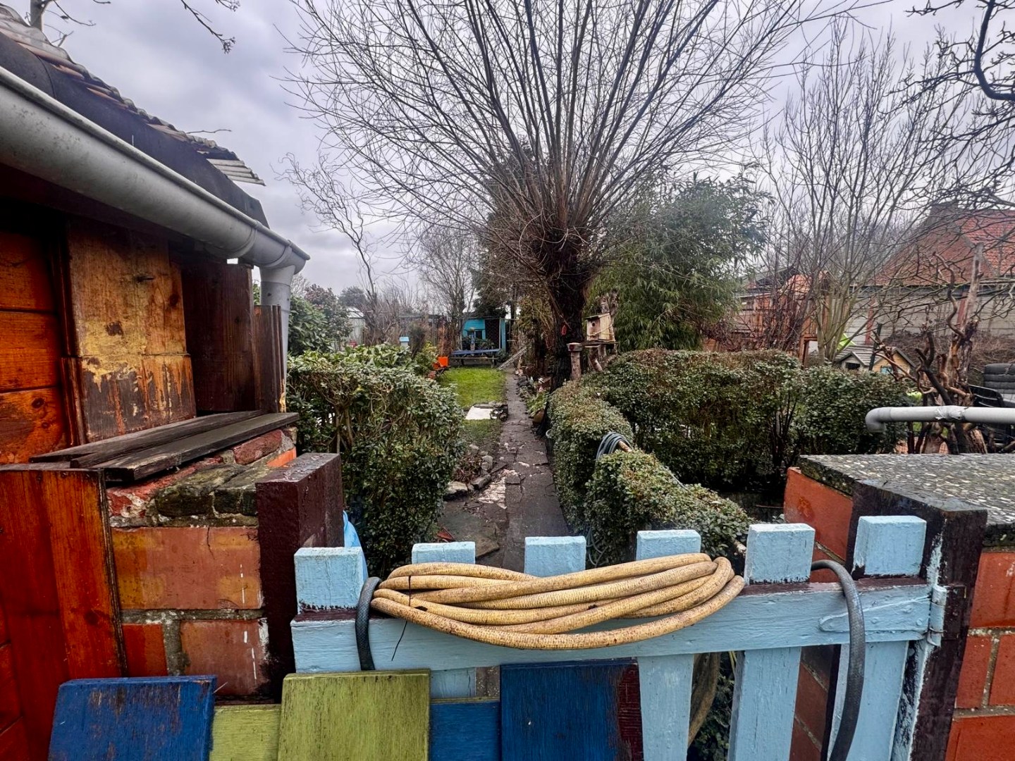 Te renoveren woning met brede gevel van 7,5 m, grote tuin en uitzonderlijk potentieel in Dendermonde - foto 5