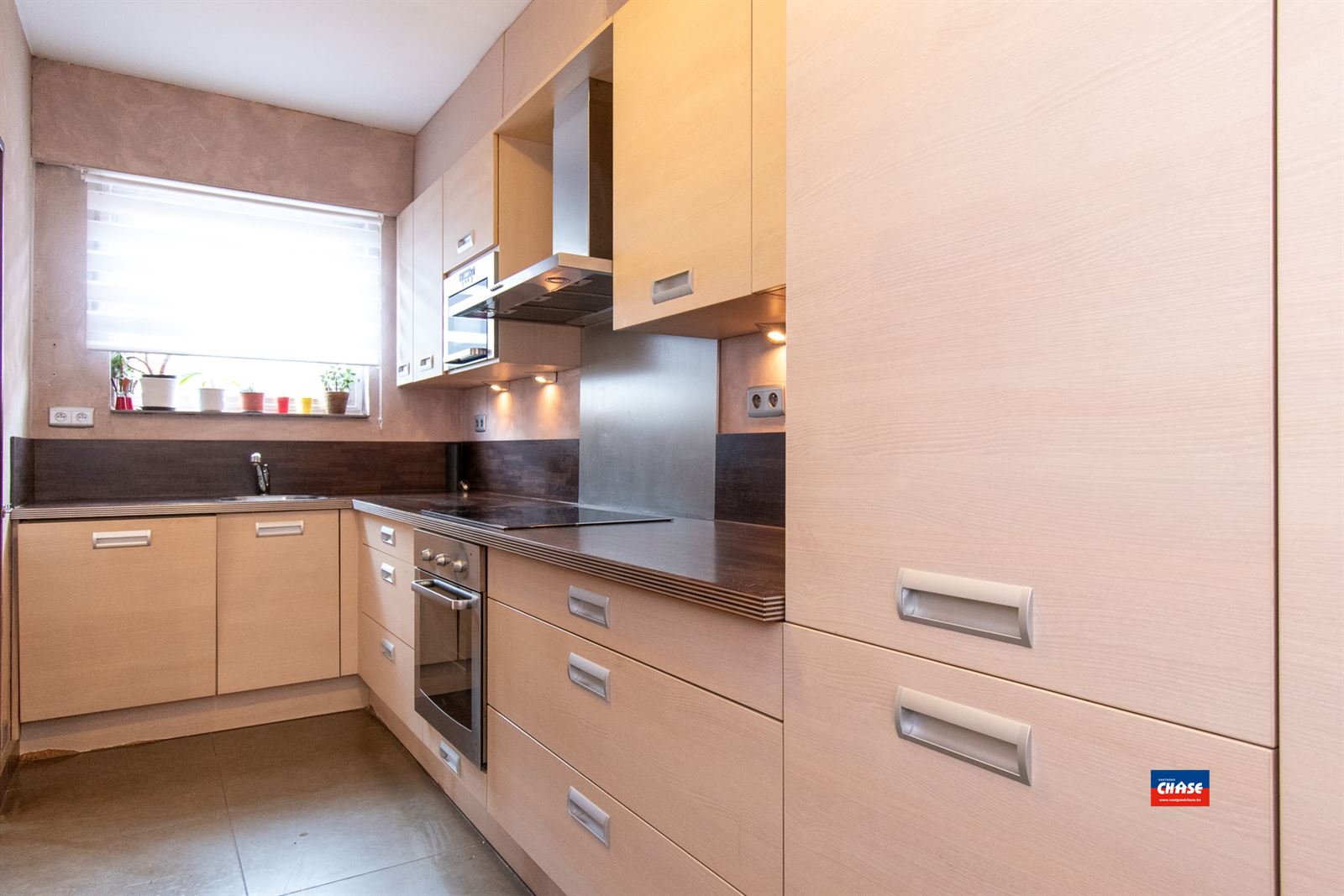 Gelijkvloersappartement met 2 spks, tuin en garage - foto 4