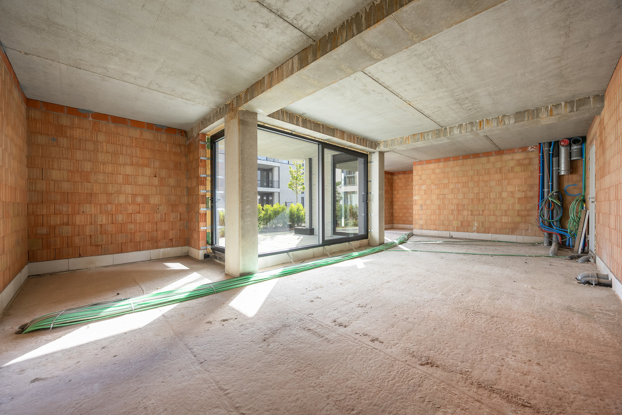 Polyvalente commerciële unit in nieuwbouwproject met terras - foto 2
