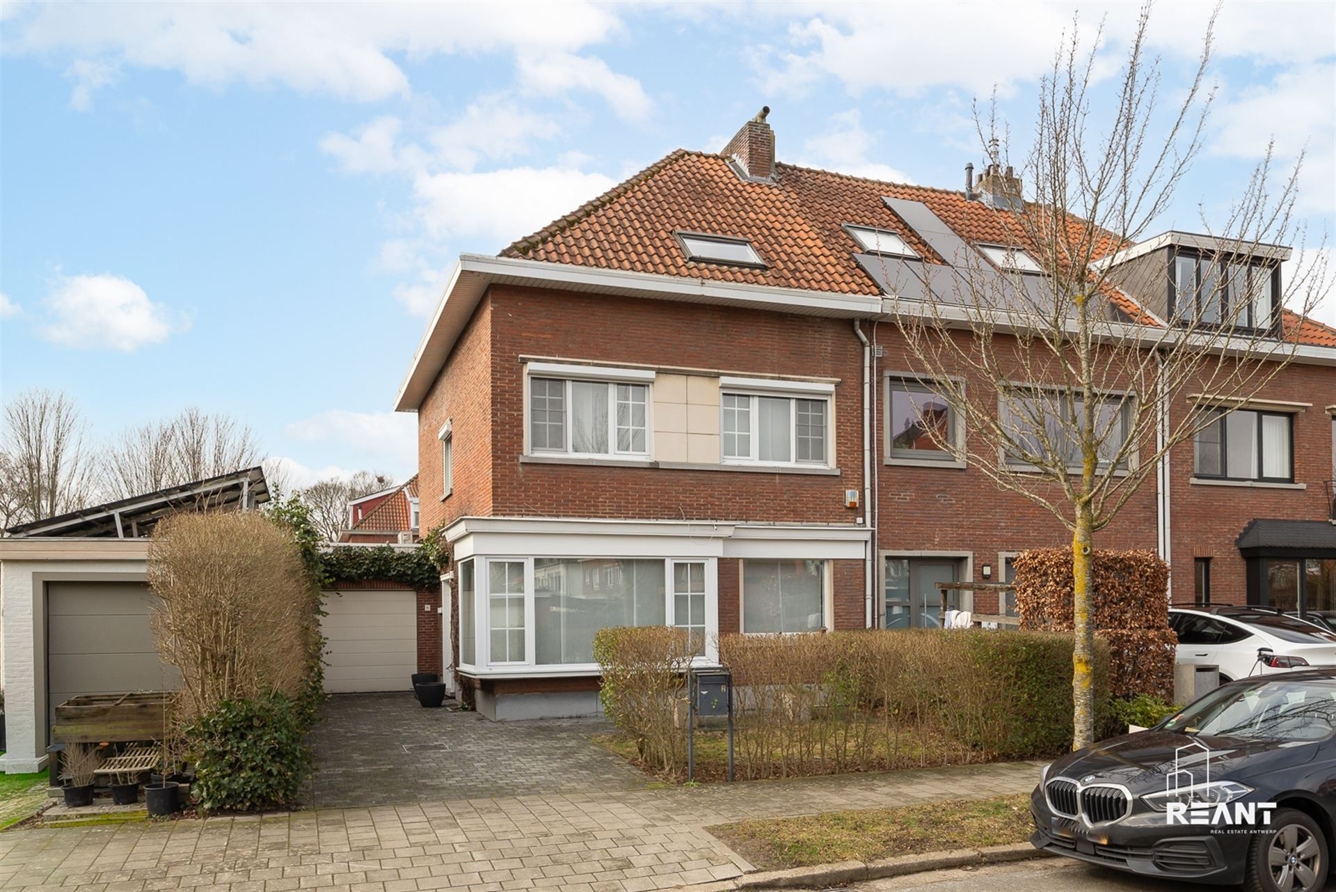 Halfopen bebouwing op toplocatie in de Molenveldwijk te Edegem - foto 1