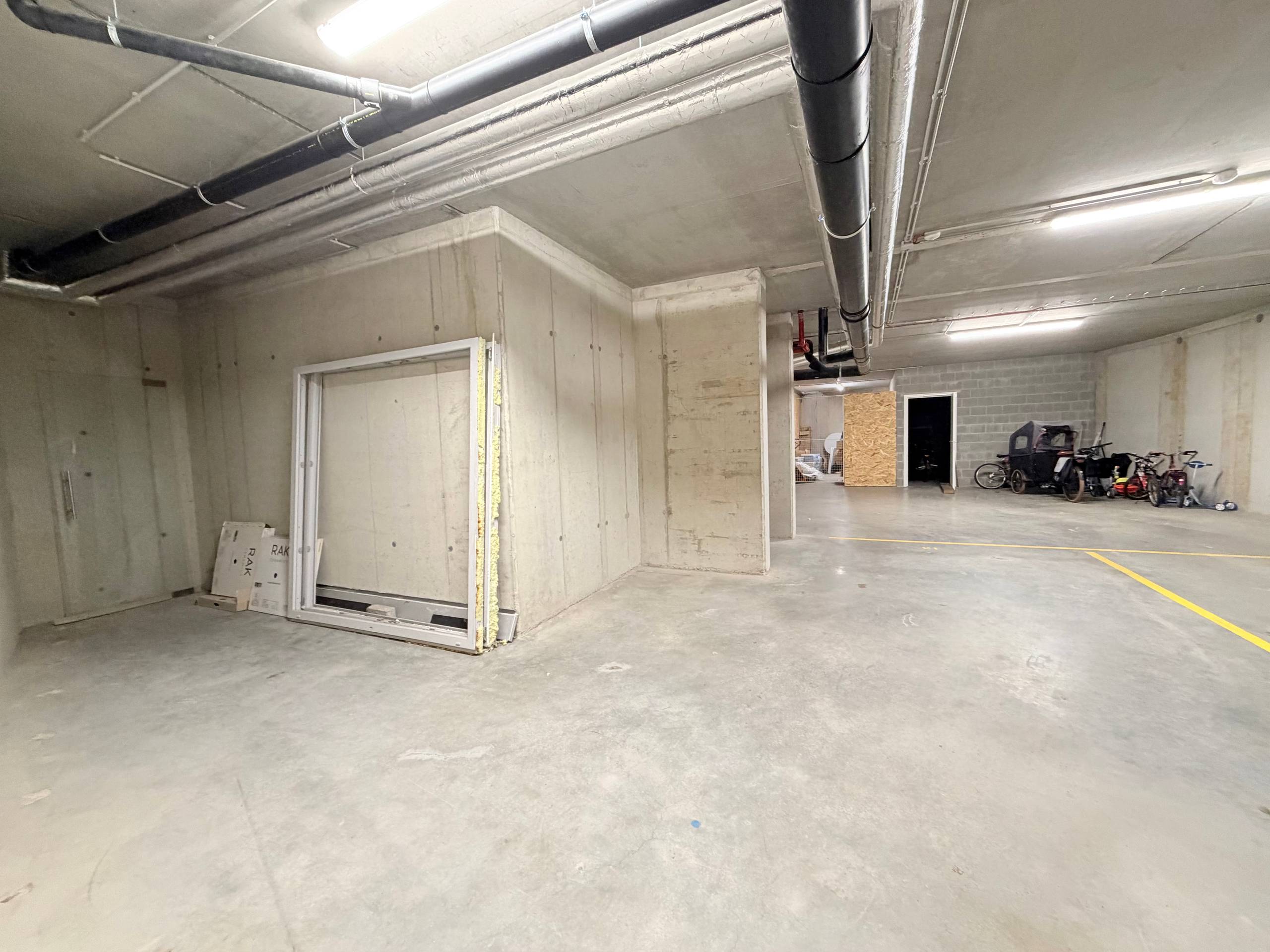 Ondergrondse autostaanplaats in centrum van Evergem - foto 2