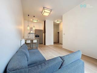 <p>Tel: 0456 12 69 85 Email: clara.ja@weinvest.be<br /><br />We Invest is pleased to present this stunning one-bedroom apartment, exclusively available and offering a generous surface area of 70 m².<br /><br />Located in an iconic building in the heart of Brussels, this exceptional space combines prestige with historical charm. Formerly the General Savings and Pension Fund, the building captivates with its majestic architecture blending classical elegance and Art Deco touches. Ideally situated near public transport, shops, and key Brussels institutions, this property is a perfect opportunity for those who appreciate characterful living spaces.<br /><br />The apartment features a bright living room open to a modern, fully equipped kitchen with a central island. It also includes one bedroom, a bathroom with a bathtub, a walk-in shower, and a laundry area.<br />A private parking space is also included.<br /><br />The rent is €1,230, including the private parking space.<br /><br />Charges amount to €220 and include: water, heating, concierge service, and maintenance of the common areas.<br /><br />EPC:B+<br /><br />Available immediately !<br /><br />Don’t miss this opportunity! To discover more exclusive listings, visit www.weinvest.be!<br /><br /><br /><br /></p>