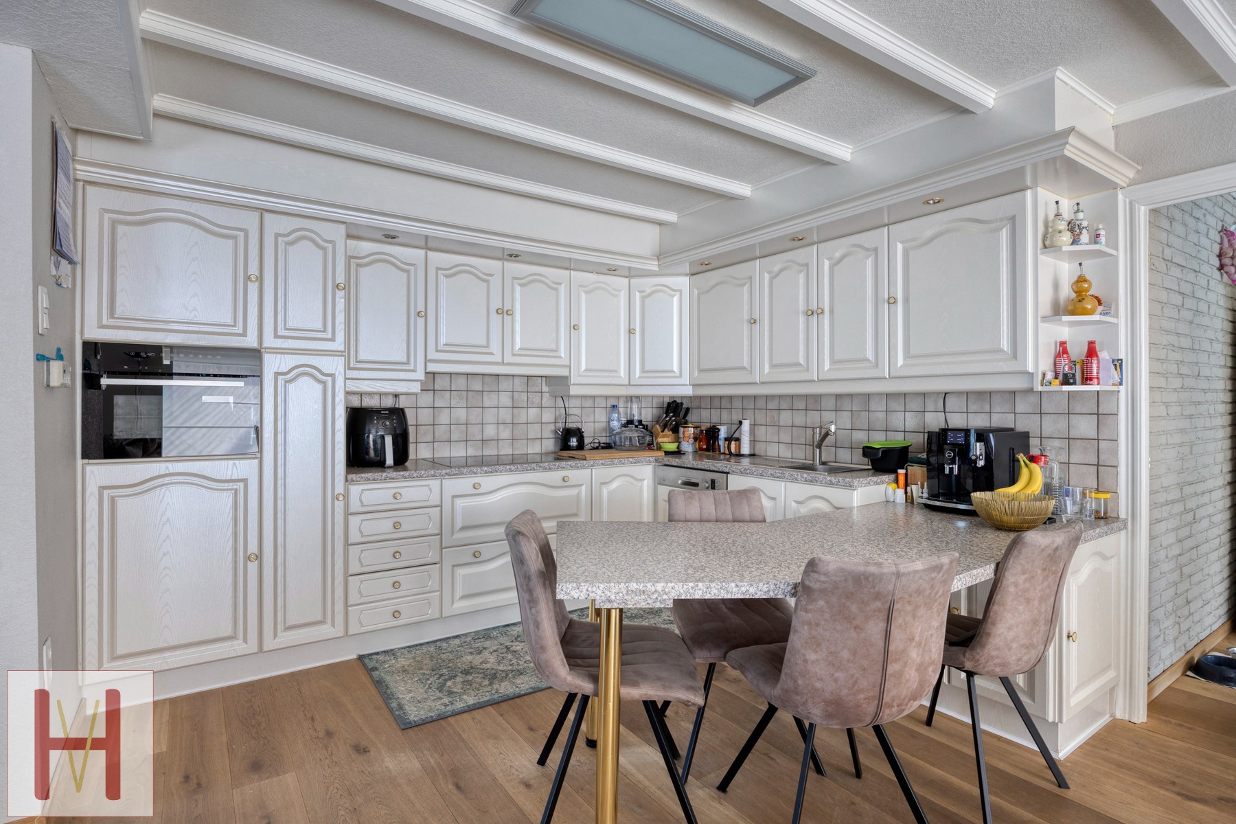 Woning op een hoekperceel met een magazijn van +/- 100m². - foto 5